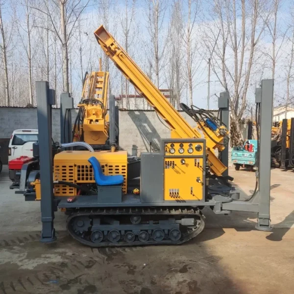 Crawler drilling rig with yellow and gray components, designed for construction and drilling tasks.